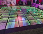 LED dance floor with colorful lighting at an event venue.
